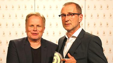 Herbert Grönemeyer, Gewinner des Sonderpreises, mit Laudator Peter Lohmeyer. © AR/NDR Foto: AR