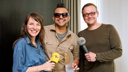 Der jamaikanische Dancehall-Künstler Sean Paul (Mitte) im Interview mit Magdalena Bienert (Fritz, rbb) und Xander Philipps (Berliner Rundfunk 91.4). © Deutscher Radiopreis/Kay Christian Säger Foto: Kay Christian Säger