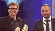 Preisträger Marcus Engert und Christian Bollert auf der Bühne beim Radiopreis 2012.  