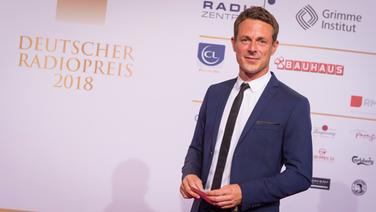 Moderator Alexander Bommes beim Deutschen Radiopreis. © Deutscher Radiopreis / Benjamin Hüllenkremer Foto: Benjamin Hüllenkremer