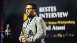 Gewinner in der Kategorie "Bestes Interview": Nabil Atassi von SWR1 Baden-Württemberg Gewinner in der Kategorie "Bestes Interview": Nabil Atassi von SWR1 Baden-Württemberg © Deutscher Radiopreis / Benjamin Hüllenkremer Foto: Benjamin Hüllenkremer