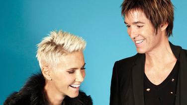 Marie Fredriksson und Per Gessle von Roxette lachen. © Caroline Roosmark 